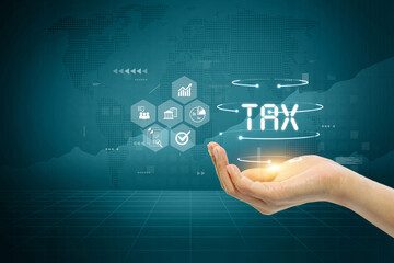 A hand holds a glowing TAX icon in front of a digital interface, representing modern and technological tax solutions.
