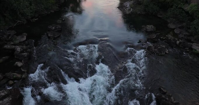River flow view from a bridge in the evening