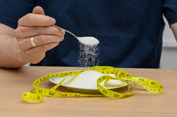 Sweetener instead of white sugar, xylitol, erythritol on a spoon