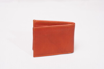 Open light brown leather wallet with a smooth finish and visible stitching, offering timeless style...