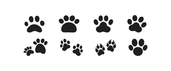 Black animal paw print vector set. Pet footprint icons in silhouette style, perfect for dog, cat, puppy, pet care, vet clinic, adoption, and animal-related graphic design projects.