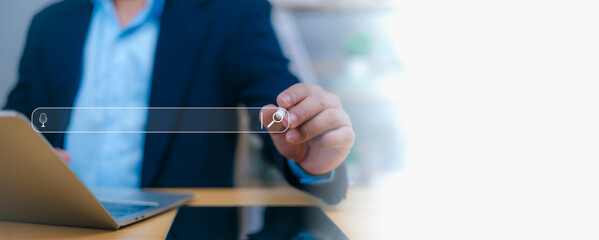 Person interacts with a futuristic search bar, symbolizing online search, digital marketing, and web browse. Concepts of information discovery, SEO, data retrieval, and internet connectivity.