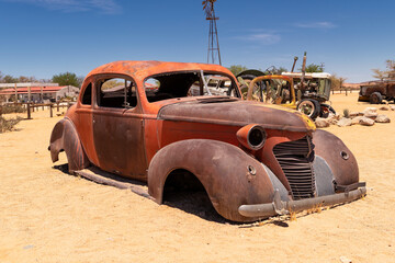 rusted colorful body of old car near solitaire, namibia