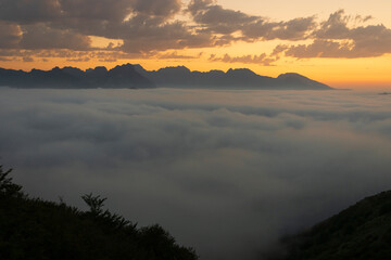 clouds seen from above the mountain at sunset