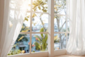 Fototapeta premium Defocused window background with white curtains in morning time.