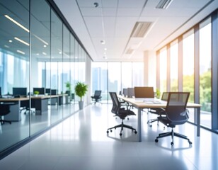 Modern office interior with large windows, showcasing a bright workspace and city skyline