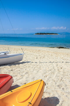 Kayaks on the beach on the Tropical Island Getaway