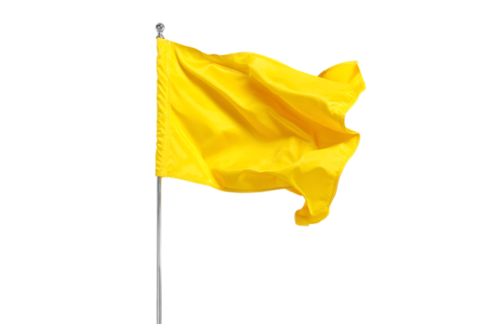 Yellow flag waving in the wind on a pole.