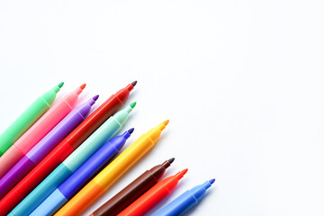 colorful felt-tip pens is displayed on a clean white background