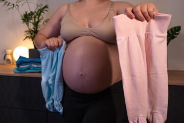 Pregnant woman with big belly in anticipation for the motherhood. Concept of pregnant woman...