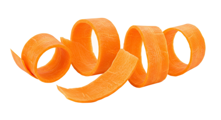 Close up studio shot of vibrant orange carrot shavings in a spiral shape