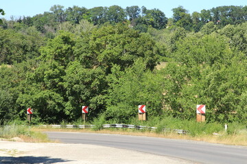 A road with trees on the side