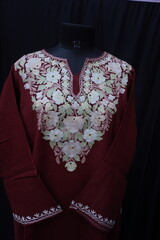 Display of Kashmiri Pheran , Traditional Dress of kashmir