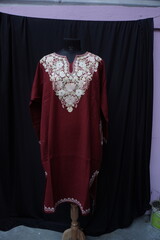 Display of Kashmiri Pheran , Traditional Dress of kashmir