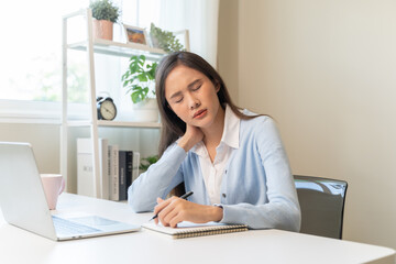 Office workers have neck pain from bad posture during sitting and work.