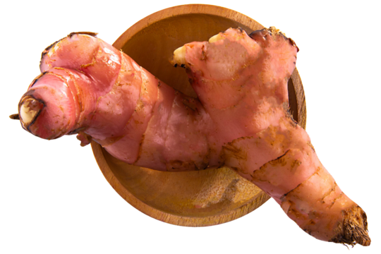 galangal on wooden bowl top view isolated on white