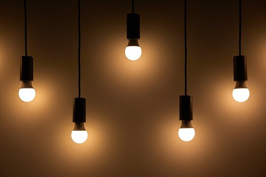 Lightbulbs hanging on wires, soft decoration lighting