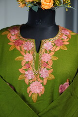 Kashmiri pheran displayed on a mannequin in Kashmir