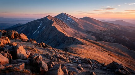 Obraz premium Mountains glow at sunset
