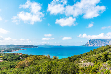 Panoramic view of Capo Coda Cavallo under a cloudy sky