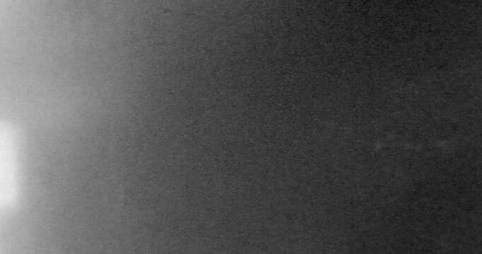 Aged Film Noise Dust Scratches, Old Documentary Video Effect. Backdrop, seamless loop for text or video or image