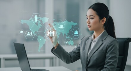 Businesswoman interacts with global data overlay on laptop