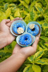 hands holding flowers
