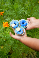 woman holding a flower