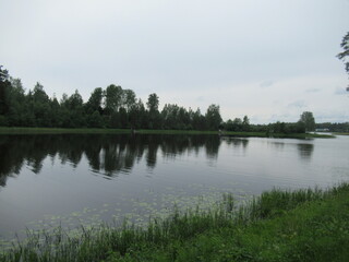 The landscape stretches into the distance with a view of the river. The water surface. Nature in...