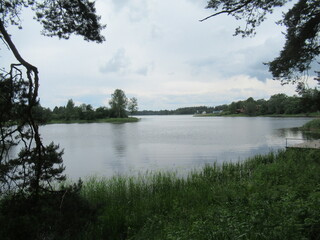The landscape stretches into the distance with a view of the river. The water surface. Nature in...
