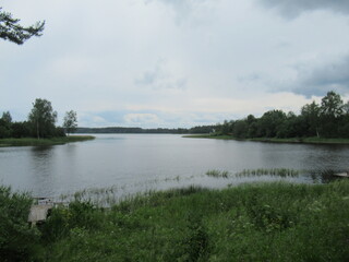 The landscape stretches into the distance with a view of the river. The water surface. Nature in...