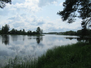 The landscape stretches into the distance with a view of the river. The water surface. Nature in...
