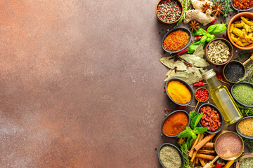 A diverse collection of vibrant spices and herbs, elegantly positioned on a brown backdrop, exuding natural beauty and a burst of fragrances