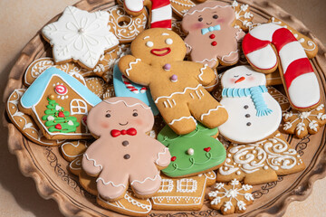 Gingerbread colorful cookies with icing decoration. Christmas sweet food. Gingerbread man baking treat. Xmas background.