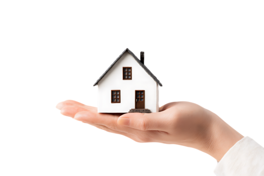 Hand holding a small model house. Real estate, home ownership concept.
