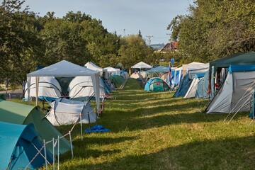 Tents group camping on a meadow