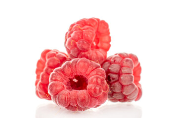 Fresh sweet raspberries isolated on white background, macro.