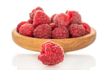 Fresh sweet raspberries isolated on white background, macro.