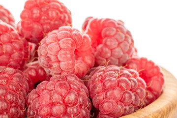 Fresh sweet raspberries isolated on white background, macro.
