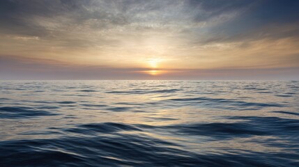 The serene ocean at sunset creating a peaceful and tranquil atmosphere.