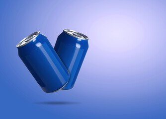 Aluminum cans in air on blue gradient background. Space for text