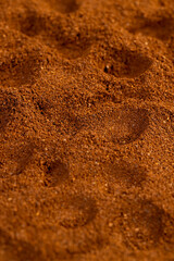 brown ground coffee , uneven ground coffee bean background for making a high-quality and aromatic coffee drink
