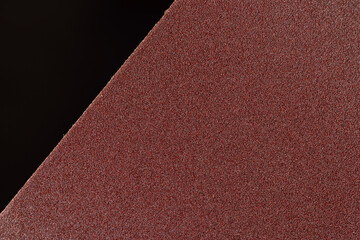 several different sheets of sandpaper for metal or wood processing