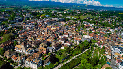 An Panoramic aerial of the old town of the city Nyon in Switzerland on a sunny day in summer	