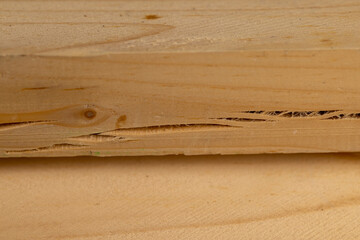 an old wooden board with cracks, a pine wood board cracked during operation