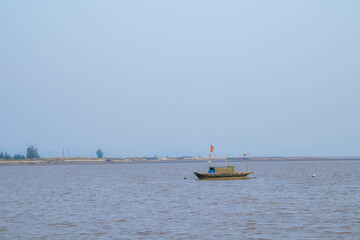 A fishing boat in the middle of the sea
