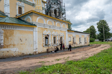 Art restorers prepare for the restoration of an ancient, dilapidated church.