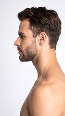 Fototapeta premium Profile of a Handsome Man with Short Brown Hair and a Beard.