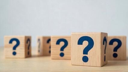 Wooden Blocks with Question Marks Symbolizing Uncertainty Inquiry Puzzles and Quest for Solutions