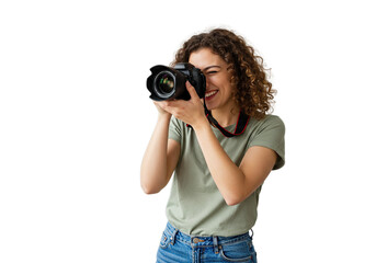 Young woman smiling while holding a camera in a photography studio